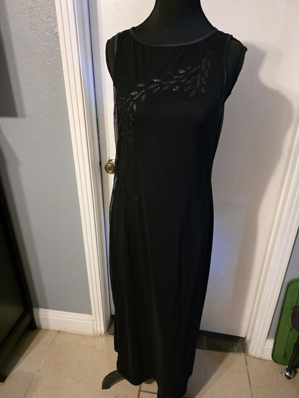 Black Sleeveless Evening Dress with Subtle Sequin Leaf Detail